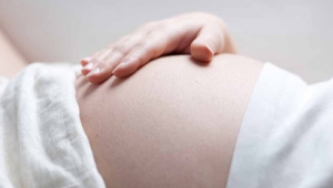Боли внизу живота при беременности: причины